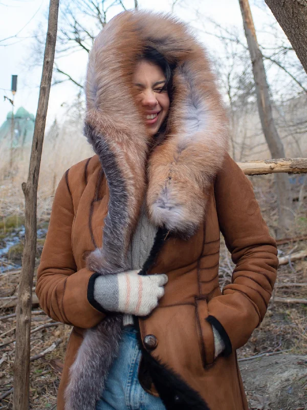 Chantal's Tan Shearling coat with large fox fur hoodie and trim